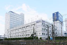 Tokyo Seimitsu's appearance, logo, and signboard